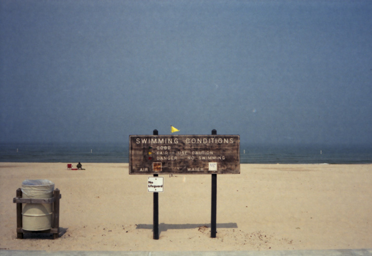 Swimming conditions sign on Lake Michigan in Pentwater, Michigan.