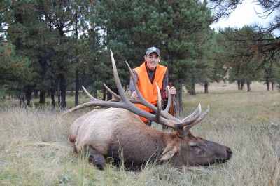 Ben Carlson, age 18 from Michigan, celebrates a successful New Mexico elk hunt