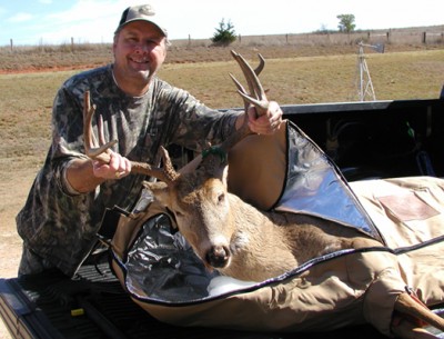 Steve Glass posing with his most recent kill ready to go in a Trophy Bag Kooler