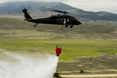 Utah National Guard practices wildland fire fighting by dropping water over West Jordon, Utah on April 17, 2012.