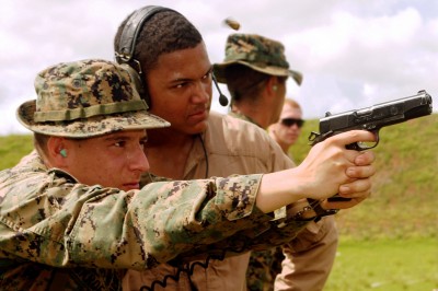 A marine fires the current version of the MEU(SOC) pistol (not the Rail Gun rumored to be the competition's winner) in a firing drill.