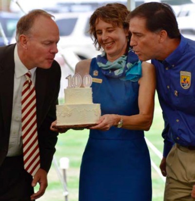 Wyoming Governor Matt Mead and USFWS Director Dan Ashe blow out the candles on the National Elk Refuge’s centennial birthday cake during a public ceremony on August 10.