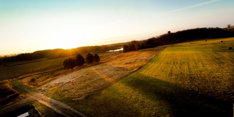 Sunrise over Timber Ridge Ranch in Ellsworth, Michigan by Lena Lee