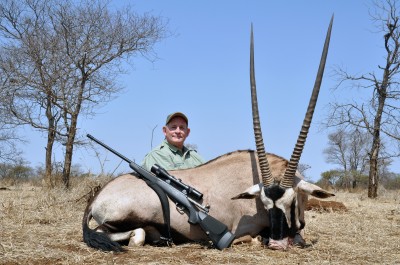 Kelly D McMillan, Managing General Partner of McMillan USA, with a nice gemsbock. Photo courtesy McMillan USA