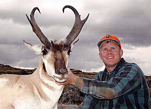 Jared J. Mason with a trophy pronghorn taken in Carbon County, Wyoming, in 2004. The buck has a final score of 84-6/8 points.
