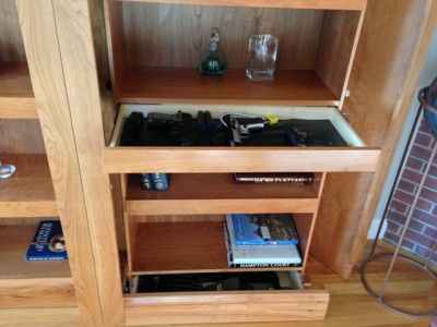 Gun storage bookshelf