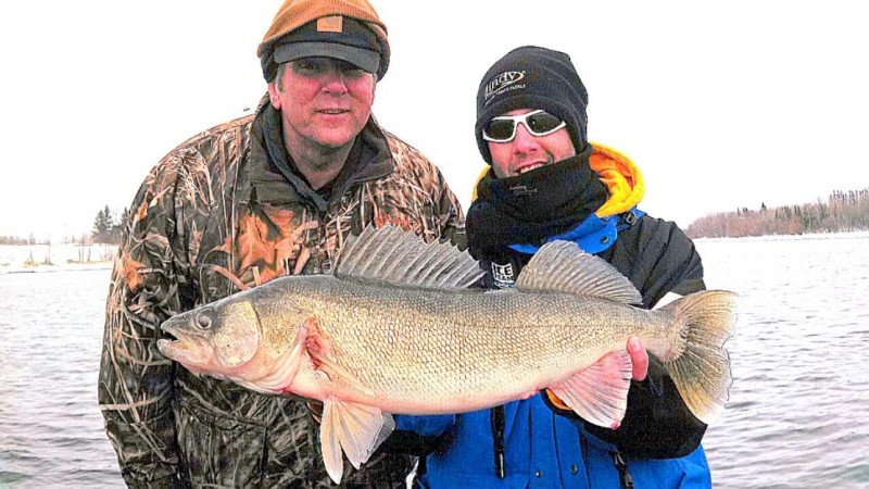 Kurt Hinton with his guide Matt Breuer of Northcountry Guide Service with a 28-inch walleye on the early Rainy River season.