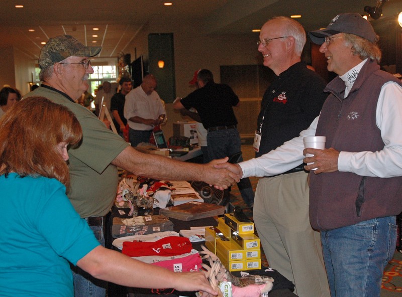 Buckmasters CEO and founder Jackie Bushman, right, greets a fan during the Buckmasters Expo last weekend at the Montgomery Convention Center.