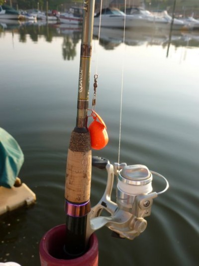 Holm adds attraction to the sinker by including a small, colorful Colorado spinner blade in the clip.