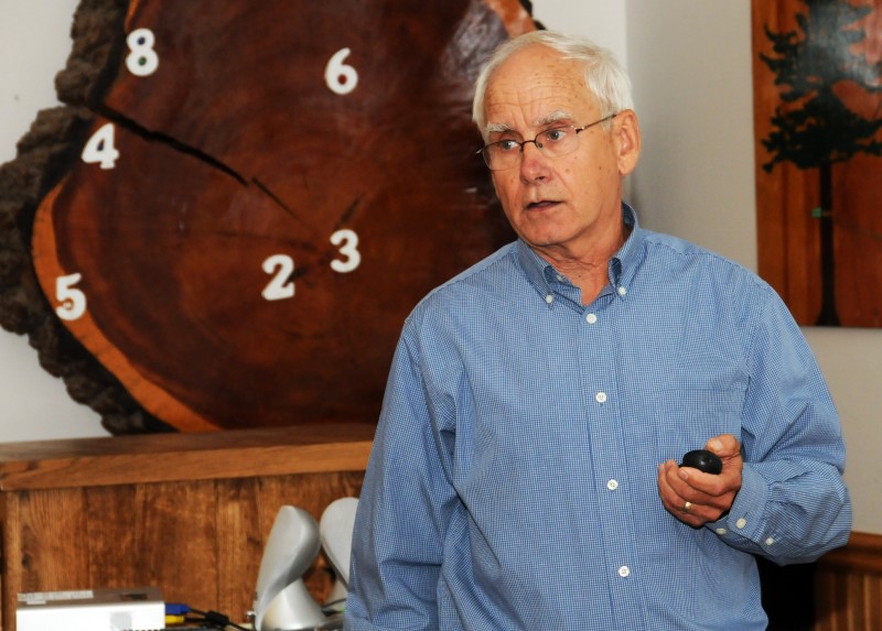Dave Clausen of Amery, a former member and chairman of the state’s Natural Resources Board, addresses the Wisconsin Outdoor Communicators Association at its annual conference July 27 in Eagle River.