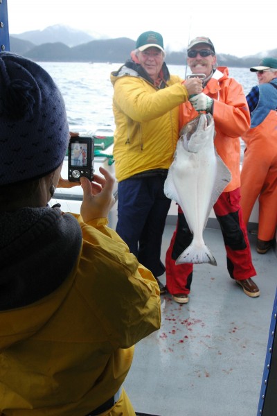It pays to take a few moments to compose the subjects to capture a good photo of the angler and the catch.