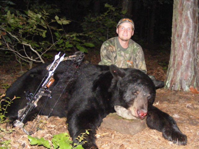 One of the key components to finding big bears is low hunting pressure. Here’s Adam Beason with a 560-pound bear killed in Arkansas in 2010. Image courtesy Bernie Barringer.