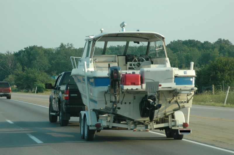 Heading south from the Midwest for a winter fishing vacation, this sweet-water angler is ready for saltwater action, with a backup kicker motor and a big cooler for his catch.