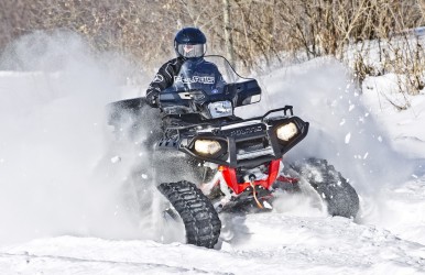 Tracks can turn any ATV into an all-terrain tank, ready to go anywhere, year-round. Image courtesy Polaris.
