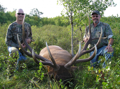 Brad Penas (left) and hunting companion Marty Lieberg pose with their trophy elk.