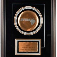 DPMS presents United Sporting Companies with Distributor of the Year Award.