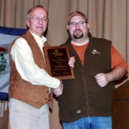 Dr. David Samuel (left) receives the 2013 Whitetails Unlimited Hunting HeritageLifetime Achievement Award from WTU Field Director Dennis Malloy at the West Virginia First Mountaineer Chapter Hunters Night Out banquet in Wheeling, West Virginia on Saturday, February 8.