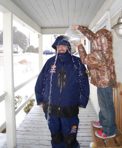 Want to make a little kid’s day? Let him dump a pitcher of ice-cold water over his dad’s head to test raingear.