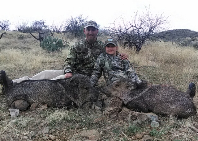 Chris and Cidney McCotter with two Arizona javelinas.