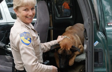 Lieutenant Lynette Shimek and a K-9 companion. Image courtesy James Swan.