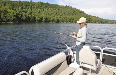 Resist the temptation to give the rod a hard yank when you find your bait is snagged. Follow this guy’s lead by giving it a steady pull, while donning sunglasses to protect your eyes in case the lure snaps free and rockets back to the boat.