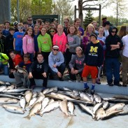 The Lake Michigan fish were biting Tuesday out of Saugatuck as approximately 65 middle-schoolers on 19 boats landed more than 80 salmon and trout in about three hours of trolling.