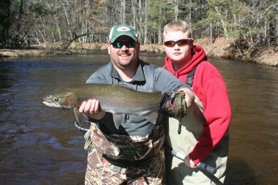 Guide Josh Mead caught this nice rainbow while fishing with his son Brandon on the Pere Marquette River in Baldwin, Michigan.