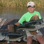 Although Linder held the big bass by one hand on the shore, it took two hands to pull the giant into the boat.