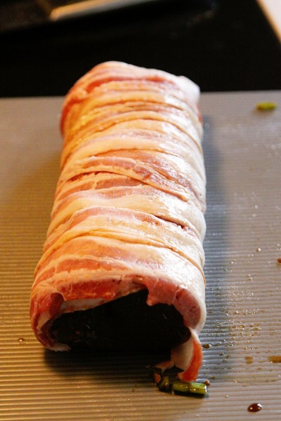 In the process of cooking this backstrap dish, you'll briefly be in possession of something resembling a bacon-wrapped burrito.