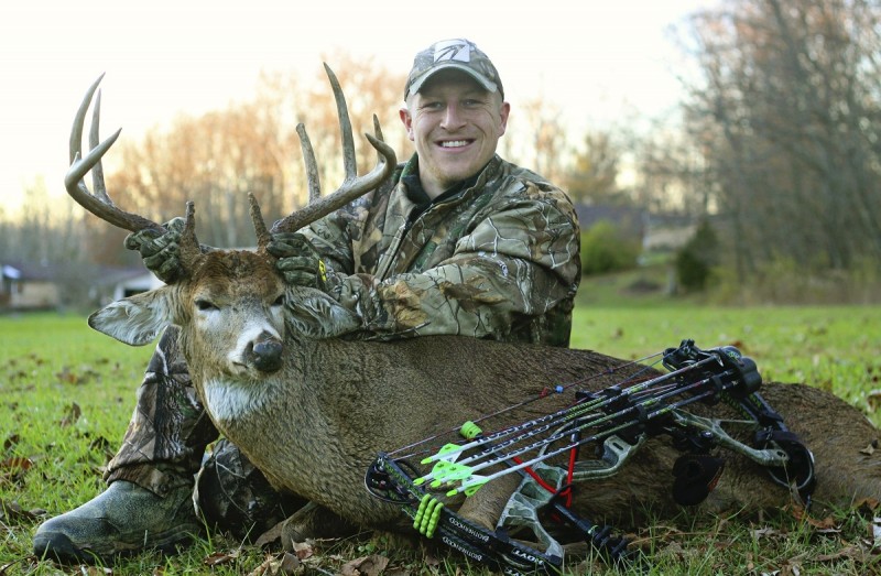 Tyler Viars with a buck he harvested in fall 2013. Read on to learn his recipe for a delicious bacon-wrapped backstrap topped with chimichurri!