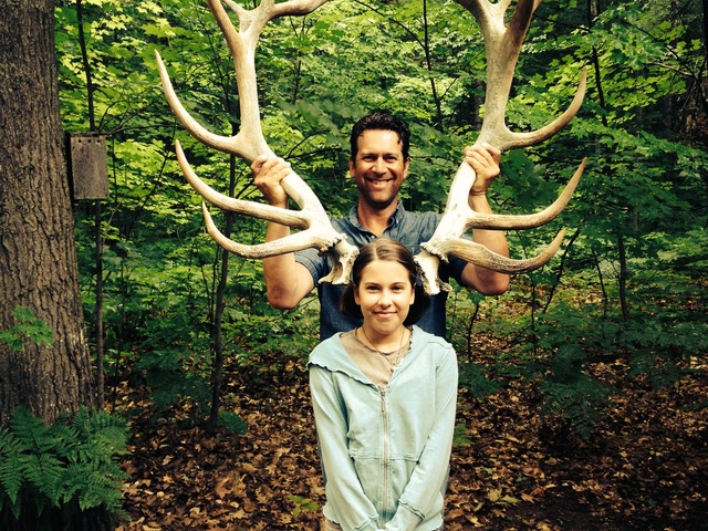 Sonja and David Moehle pose for the camera with some massive antlers.