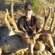 John McClendon with his potential record mule deer.