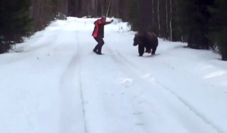 outdoorhub-video-swedish-man-channels-inner-viking-terrifies-charging-bear-2015-05-19_00-42-21.jpg
