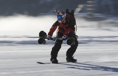 A snowboarder testing out the Thruster.