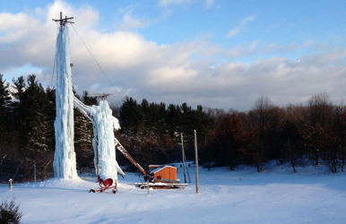 Peabody Ice Climbing Club's towers sit in the middle of an apple orchard.